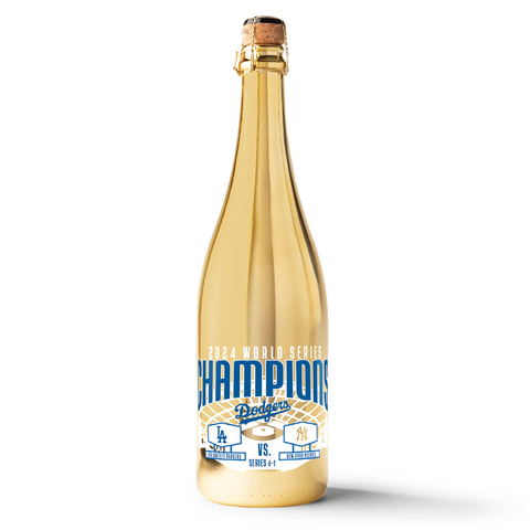 Mano's Wine gold-colored bottle of wine with a label that has 2024 World Series Champions and Los Angeles Dodgers team logo