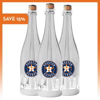 Three silver metallic bubbly wine bottles with the Houston Astros logo and Houston skyline