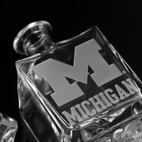 Close up of University of Michigan Logo etched decanter from Mano's Wine