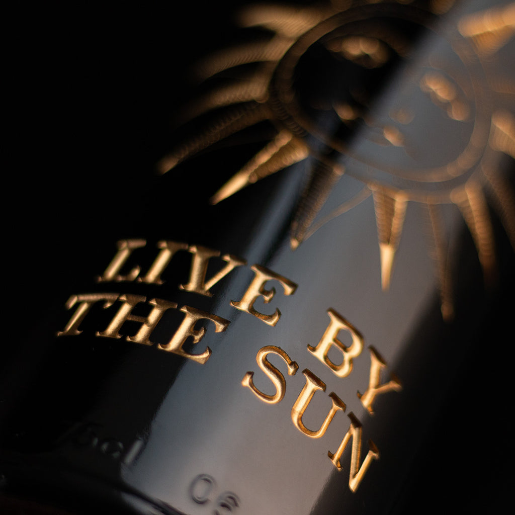 Ouija "Live By The Sun" Etched Wine Bottle