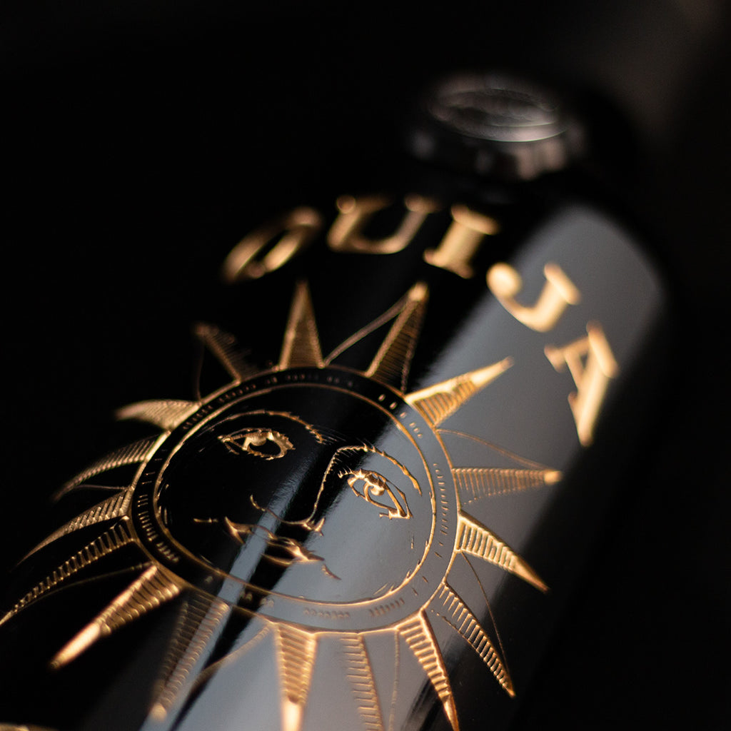 Ouija "Live By The Sun" Etched Wine Bottle