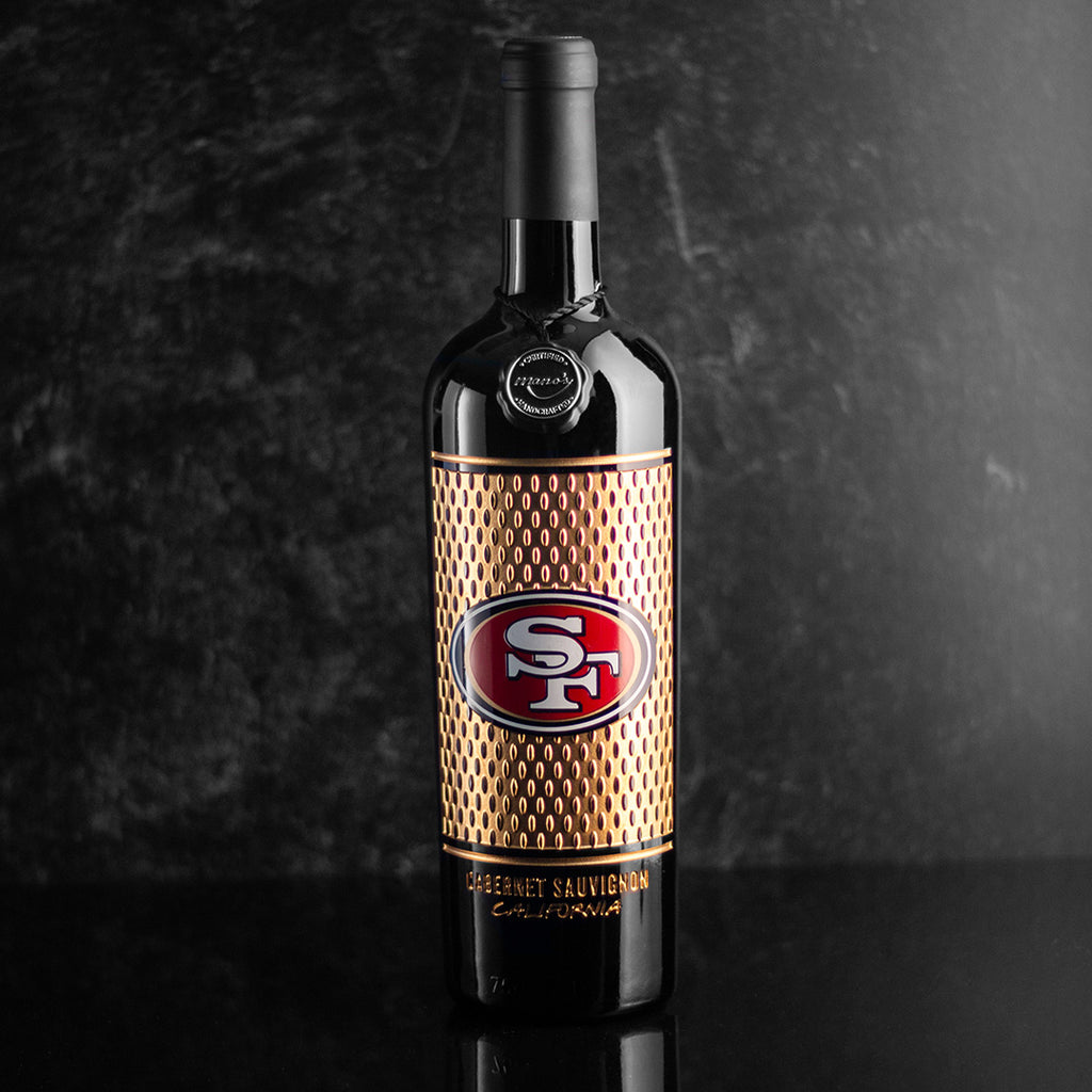 Gift the Mano's Wine San Francisco 49ers Gold Jersey Design etched wine bottle to a fan
