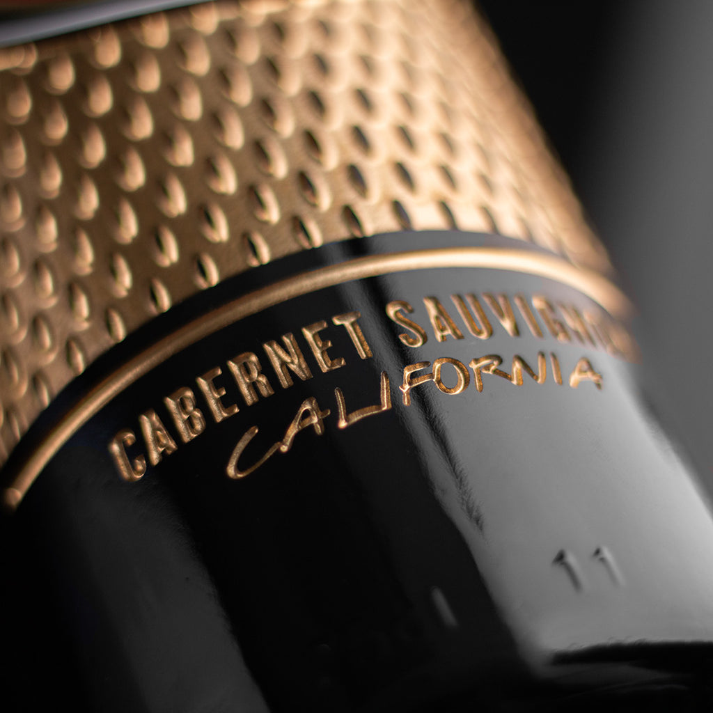 Gold cabernet sauvignon California text etched on the San Francisco 49ers Jersey Design Wine bottle