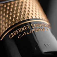 Gold cabernet sauvignon California text etched on the San Francisco 49ers Jersey Design Wine bottle