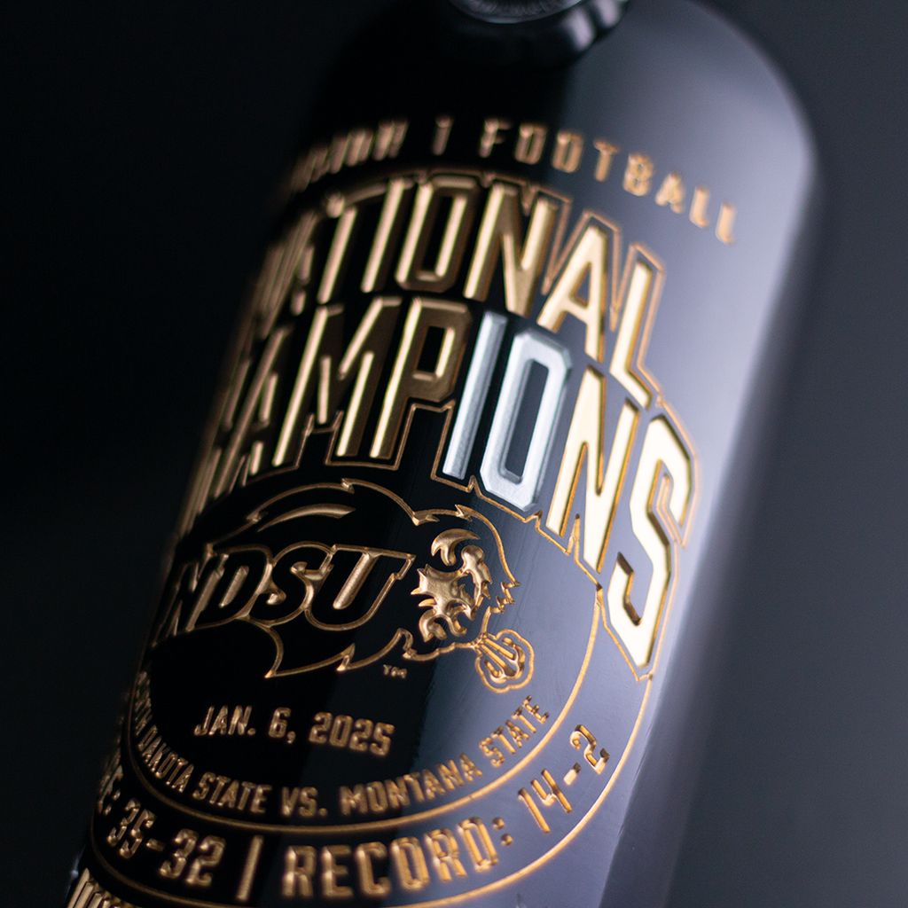 Close up of NDSU 2024 National Football Champions 10x Etched Wine bottle with NDSU Bison logo