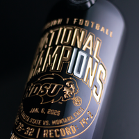 Close up of NDSU 2024 National Football Champions 10x Etched Wine bottle with NDSU Bison logo