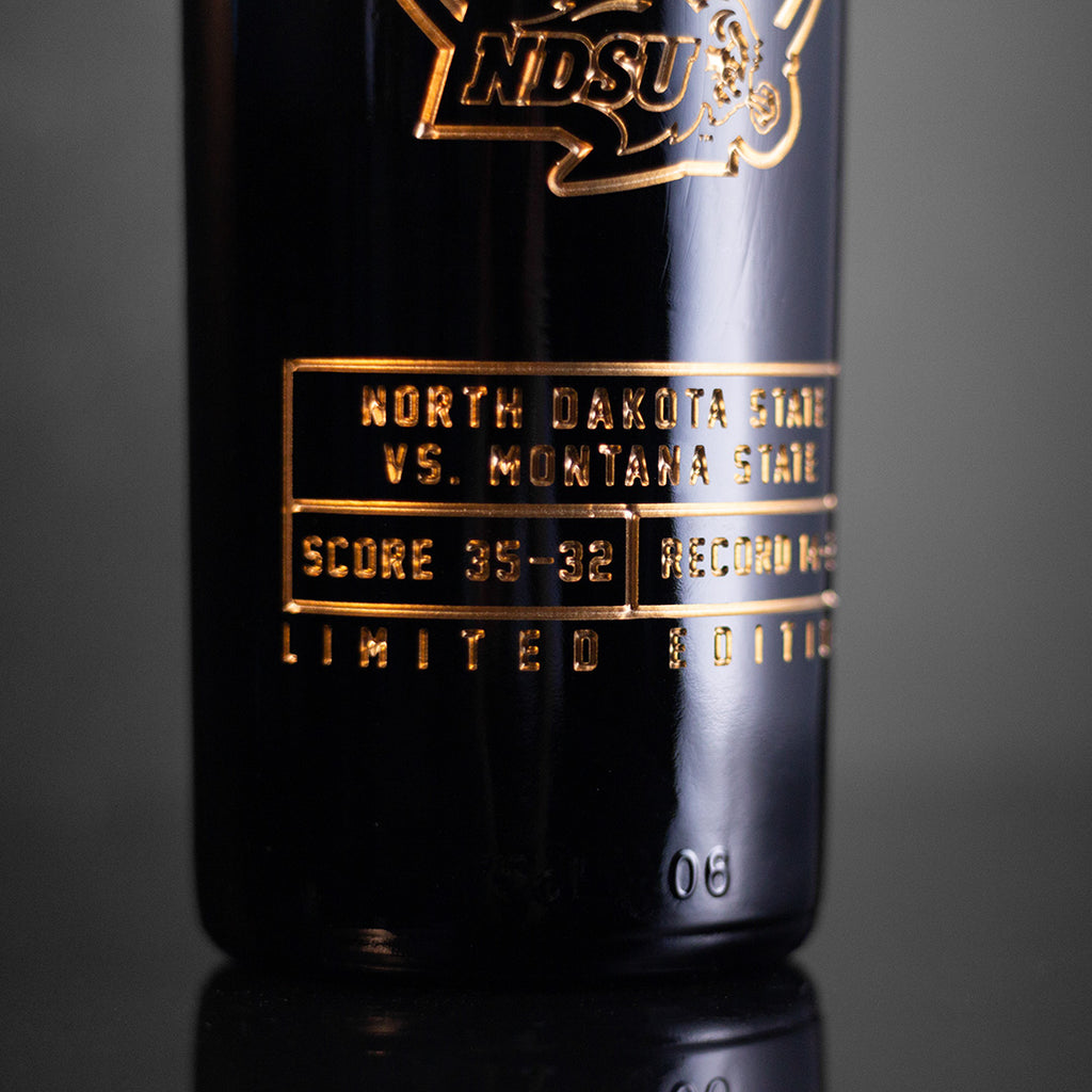 North Dakota State vs Montana State 2024 FCS Championship etched on Mano's Wine bottle