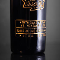 North Dakota State vs Montana State 2024 FCS Championship etched on Mano's Wine bottle