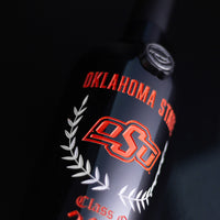 Oklahoma State and OSU etched in orange on the Oklahoma State Custom Alumni Etched Wine bottle