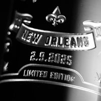 Close up look of Philadelphia Eagles etched wine bottle with text: New Orleans, 2.9.2025, and Limited Edition