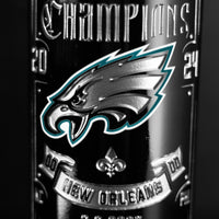 Philadelphia Eagles team logo, 2024 World Champions, New Orleans text etched on the wine bottle