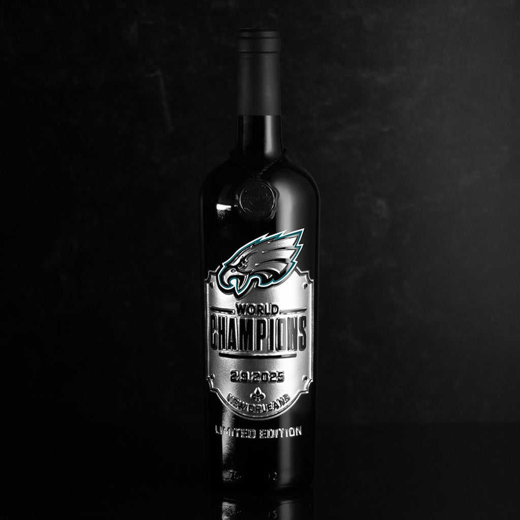 Order the Mano's Wine Philadelphia Eagles 2024 World Champions Shield etched on a wine bottle