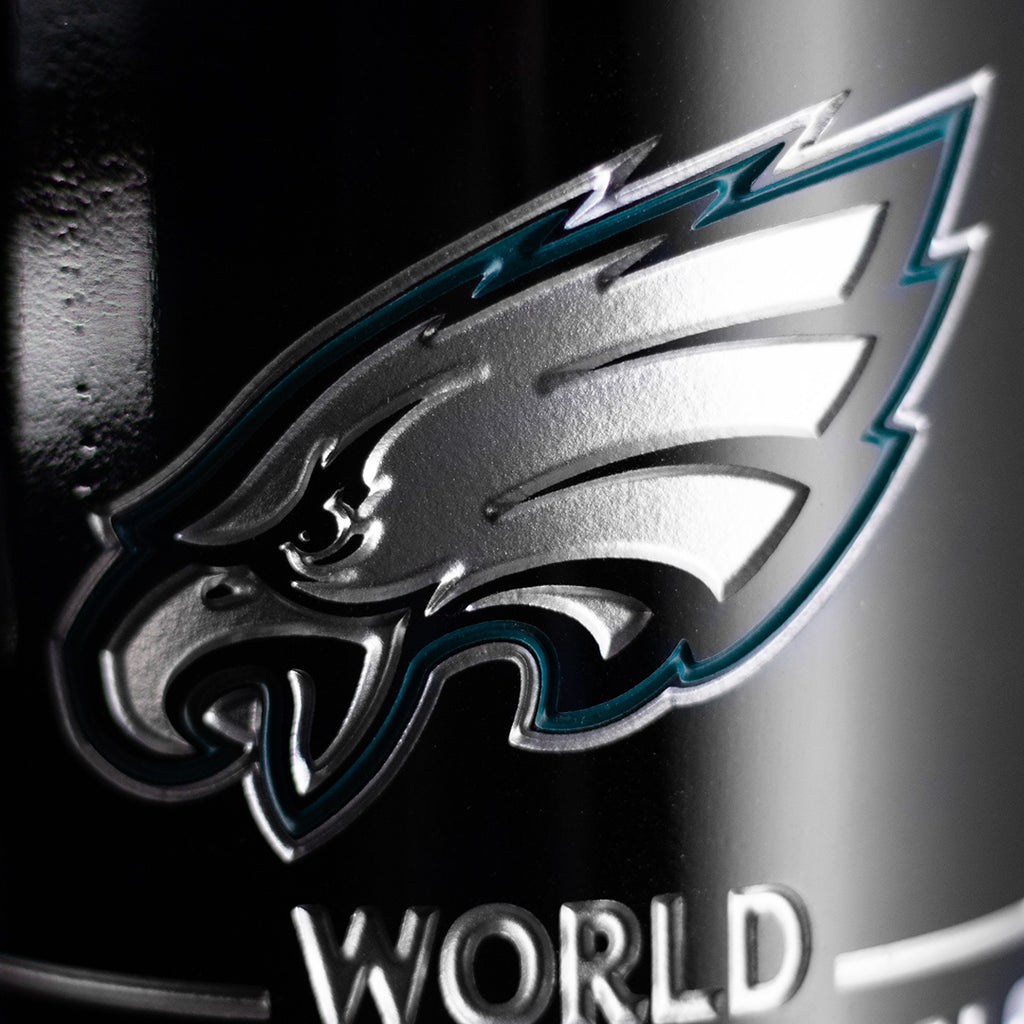 Close up view of Philadelphia Eagles 2024 World Champions etched wine bottle with Eagles team logo