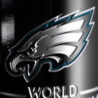 Close up view of Philadelphia Eagles 2024 World Champions etched wine bottle with Eagles team logo