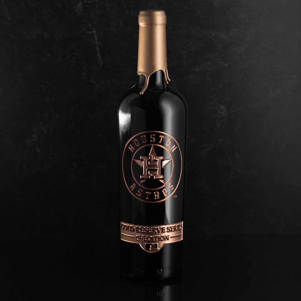 Houston Astros Gold Reserve Etched Wine bottle dipped in gold wax