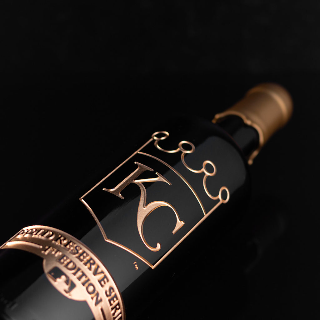Gold Kansas City Royals crown KC logo etched on Mano's Wine bottle