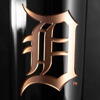 Close up image of Detroit Tigers etched in gold on a Mano's Wine bottle