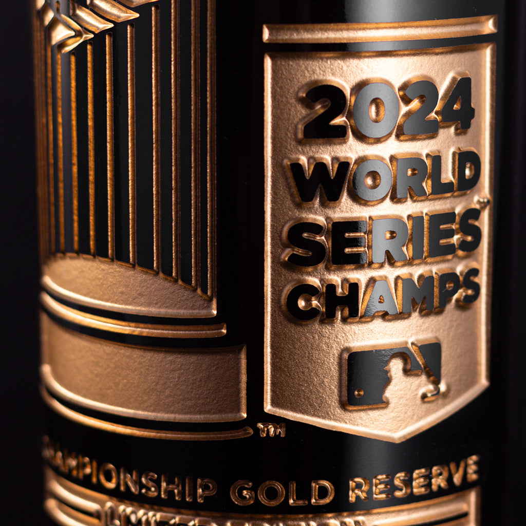 Close up of Los Angeles Dodgers Gold Reserve 2024 World Series Champs etched wine bottle