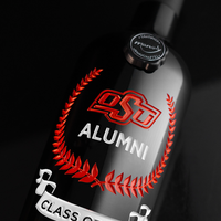 Close up view of the Oklahoma State Custom Alumni Association Etched Wine bottle from Mano's Wine