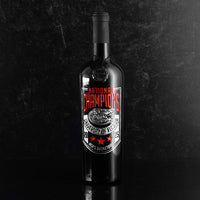 Orange and silver Mano's Wine University of Florida 2025 National Champions Banner Etched Wine bottle