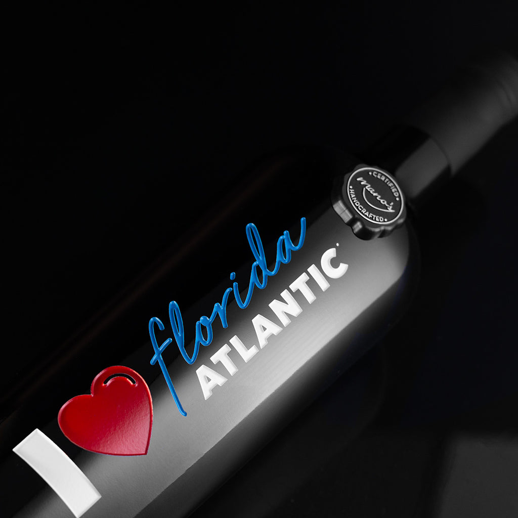 Close up view of Mano's Wine I Heart Florida Atlantic University etched wine bottle