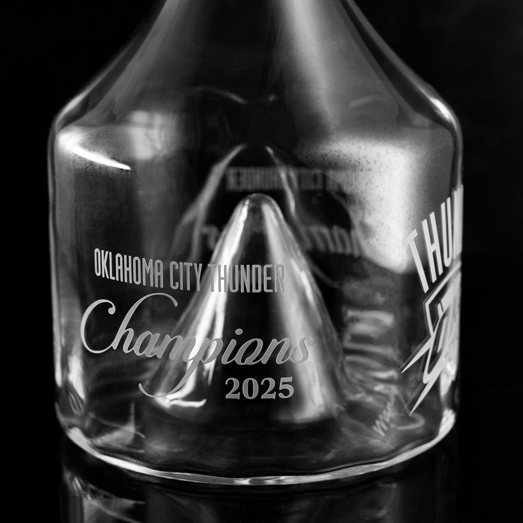Glass decanter etched with Oklahoma City Thunder Champions 2025 text sold by Mano's Wine