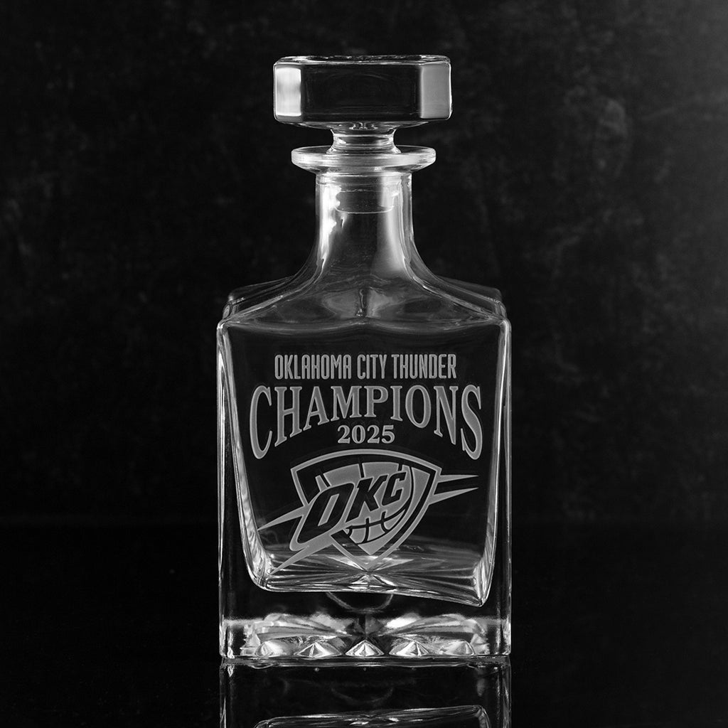 Glass decanter with Oklahoma City Thunder Champions 2025 and team logo etched on decanter