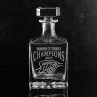 Glass decanter with Oklahoma City Thunder Champions 2025 and team logo etched on decanter
