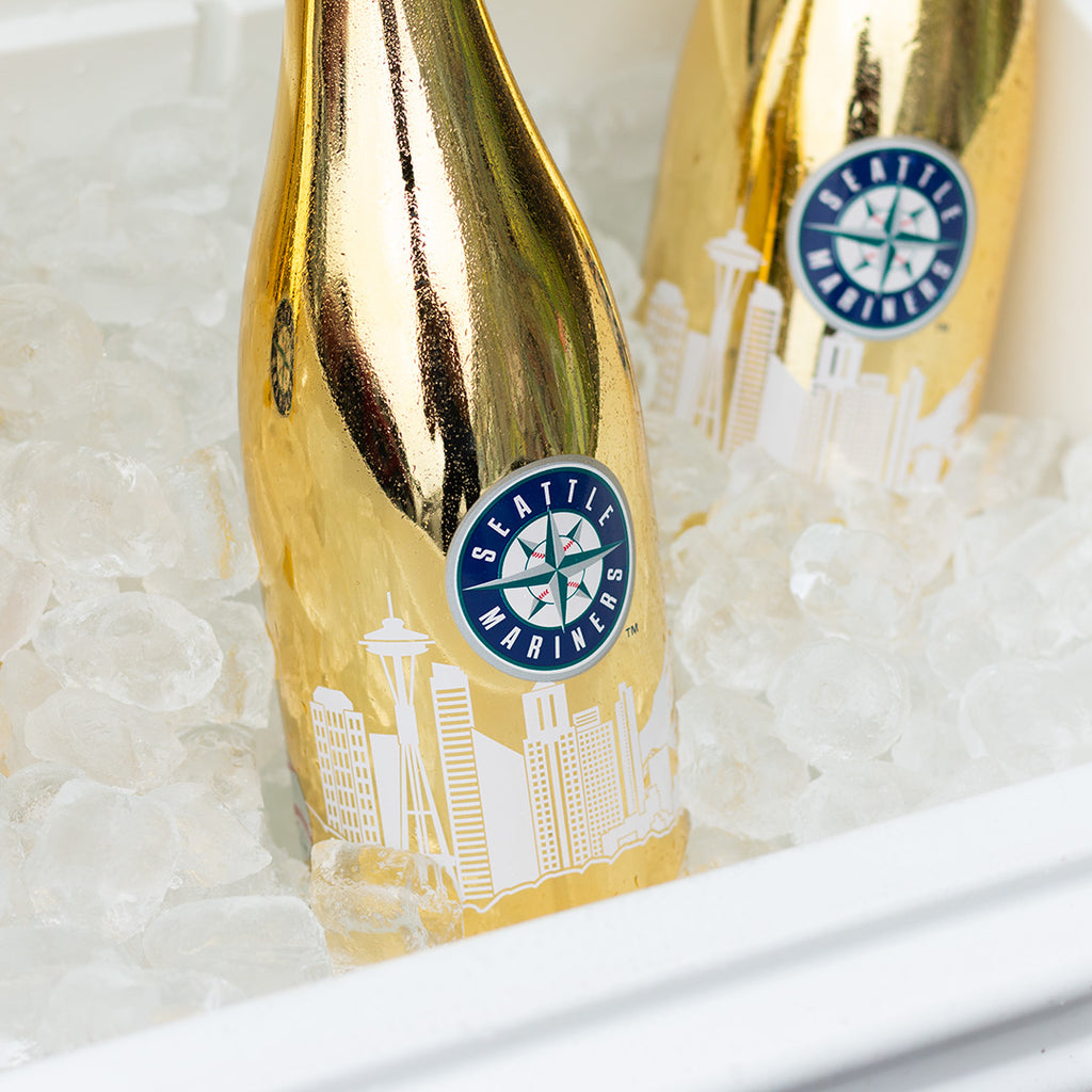 Three Mano's Wine bottles of Seattle Mariners bubbly wine on ice in a YETI cooler