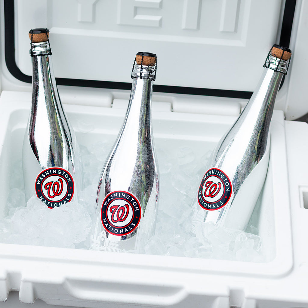 Three Mano's Wine bottles of Washington Nationals bubbly wine on ice in a YETI cooler