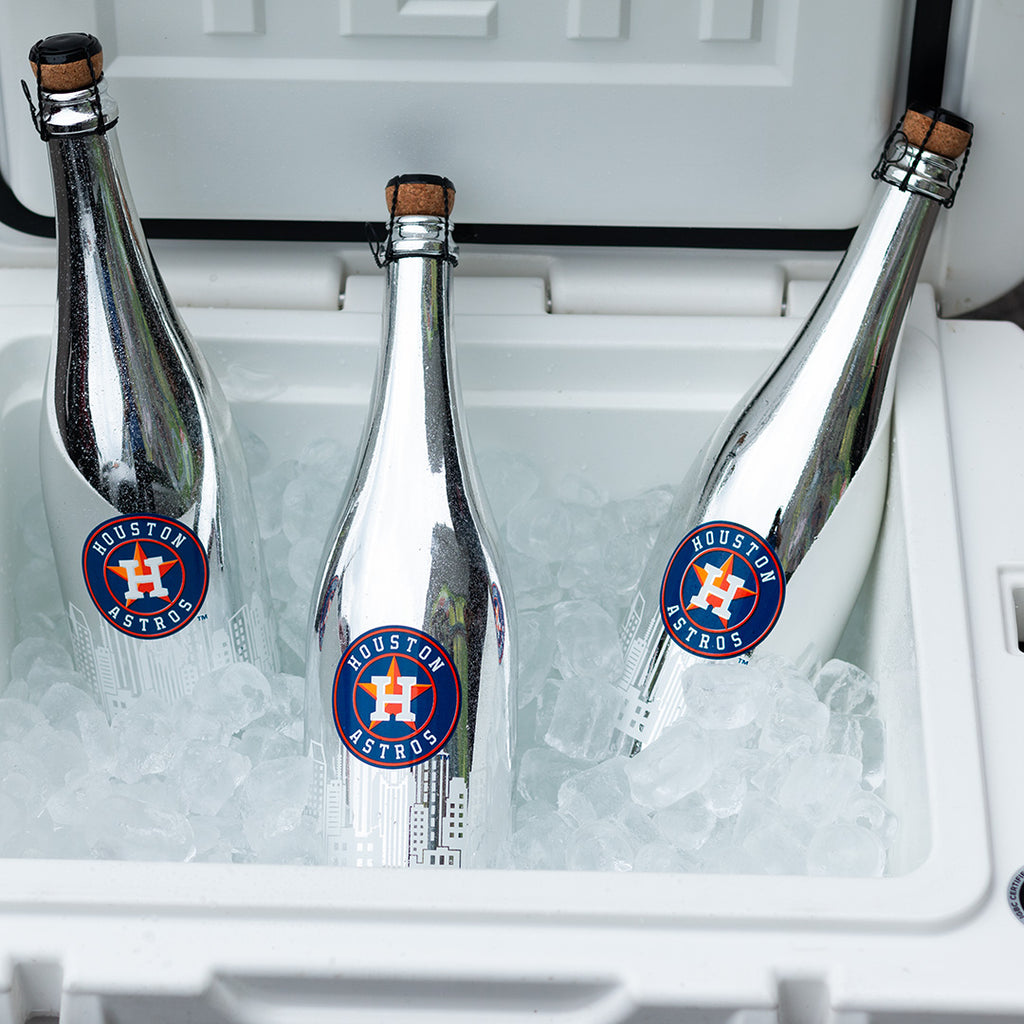 Three Mano's Wine bottles of Houston Astros bubbly wine on ice in a YETI cooler
