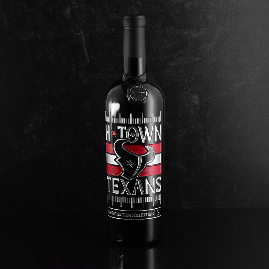 Mano's Wine cabernet sauvignon bottle etched with Houston Texans logo and "H-TOWN TEXANS" text