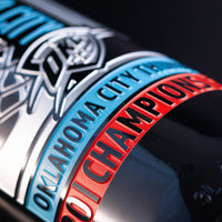 Close-up of the Mano's Wine Oklahoma City Thunder champions 3L etched wine bottle of cabernet sauvignon