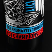 Oklahoma City Thunder team name, team logo and 2025 champions text etched on the Mano's Wine 3L cabernet sauvignon wine bottle