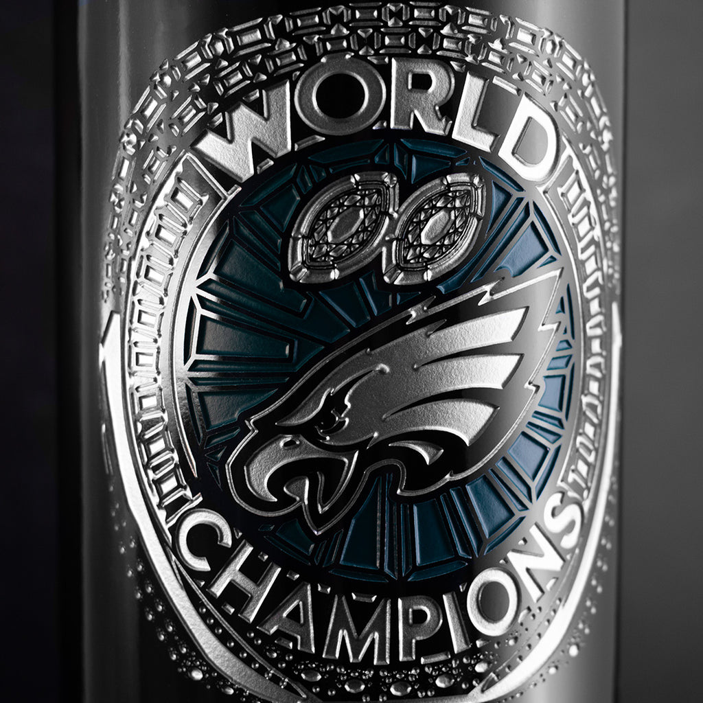 Close up of Philadelphia Eagles 3L red wine bottle with 2024 World Champions and team logo etched on Mano's Wine bottle
