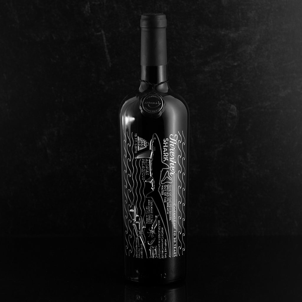 Cabernet sauvignon wine bottle etched with Thresher Shark and facts about the dangerous Thresher Shark