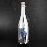 Mano's Wine Silver bottle with a blue KC Royals fountain logo with a dark background