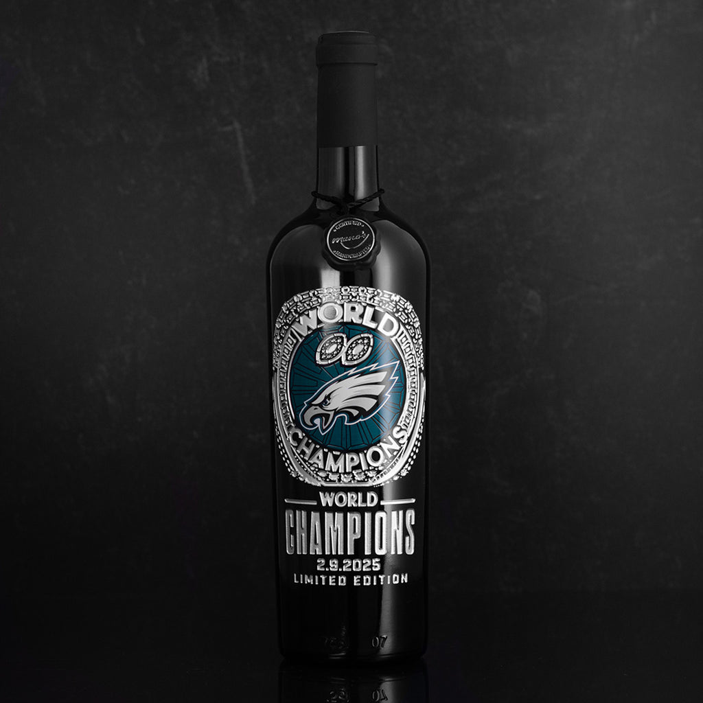 Mano's Wine limited edition cabernet sauvignon bottle etched with Philadelphia Eagles team logo and World Champions text