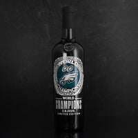 Mano's Wine limited edition cabernet sauvignon bottle etched with Philadelphia Eagles team logo and World Champions text