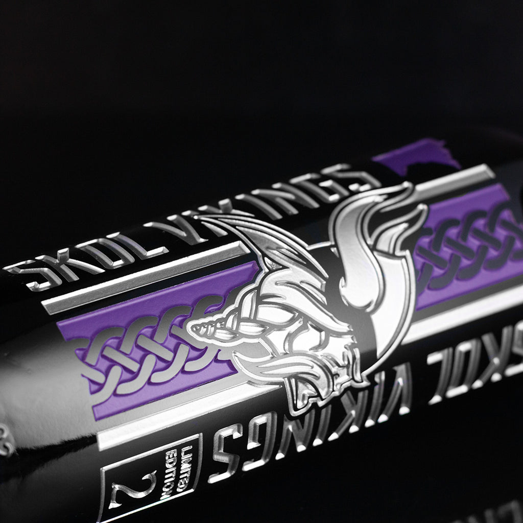 Close up look of wine bottle deep etched with Minnesota Vikings logo and iconography for Limited Edition bottle 2