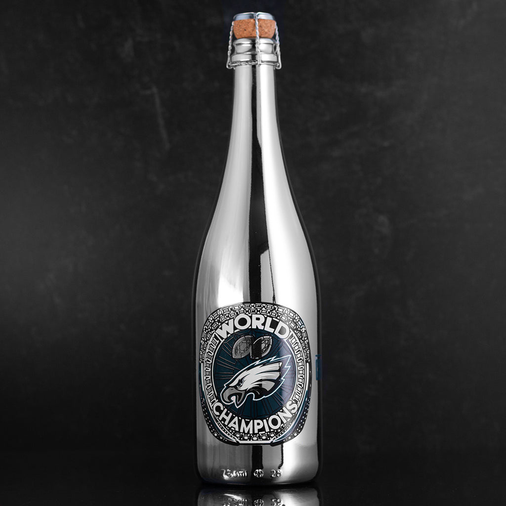 Silver bottle of bubbly wine featuring Philadelphia Eagles team logo and World Champions text from Mano's Wine