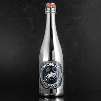 Silver bottle of bubbly wine featuring Philadelphia Eagles team logo and World Champions text from Mano's Wine