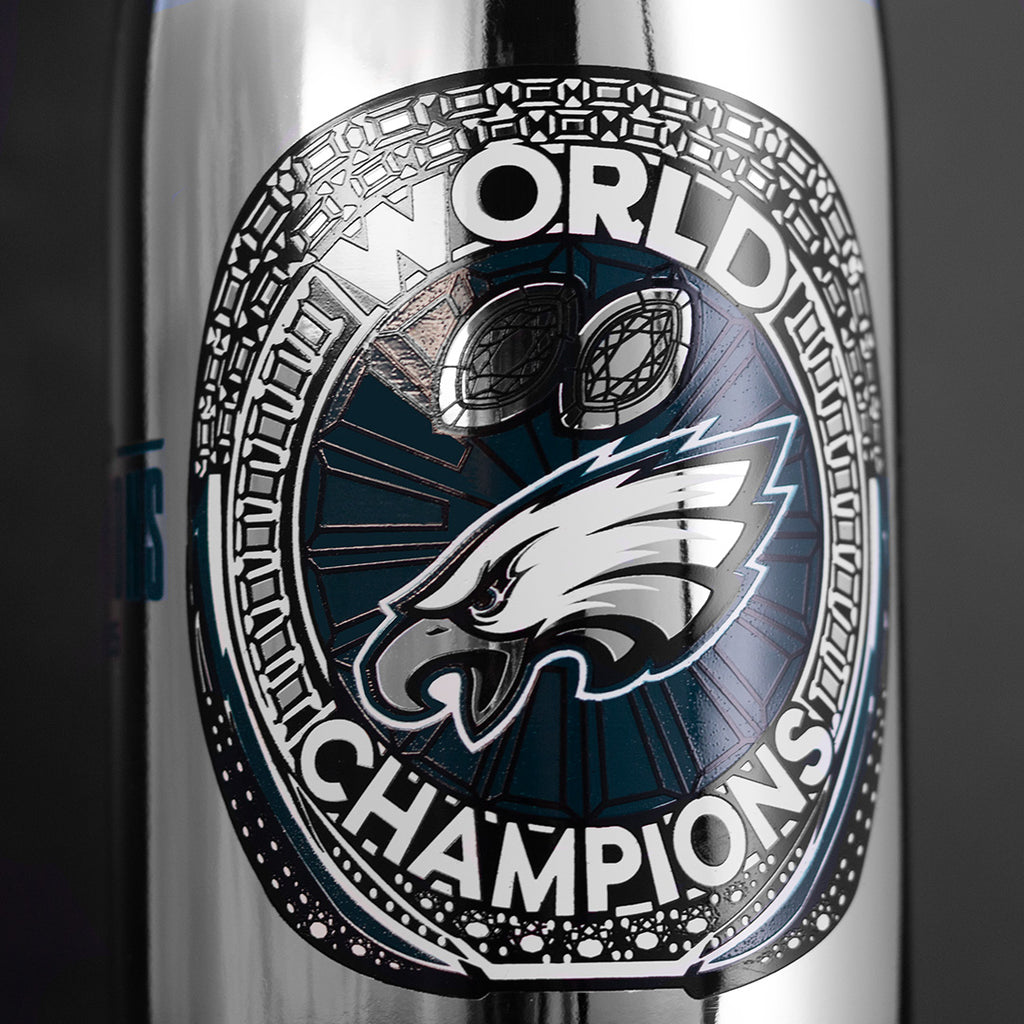 Mano's Wine silver metallic bubbly wine bottle featuring Philadelphia Eagles logo and World Champions text