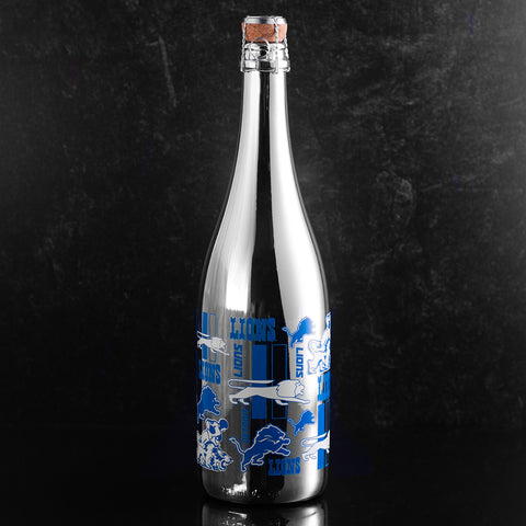 Silver bottle of bubbly wine featuring Detroit Lions logos and text from Mano's Wine