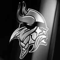 Close up of the Minnesota Vikings logo etched on a Mano's Wine cabernet sauvignon bottle