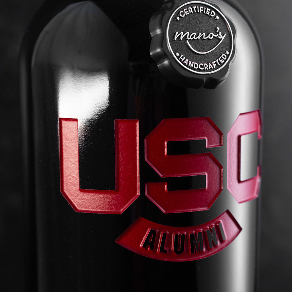 Mano's Wine bottle deep etched with University of South Carolina alumni