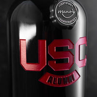 Mano's Wine bottle deep etched with University of South Carolina alumni