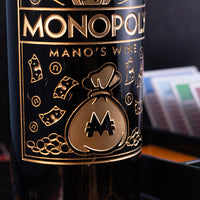 Image of Monopoly Mano's Wine golden etched wine bottle