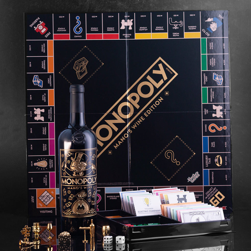 Monopoly & Mano's Wine set board, pieces, money, cards, dice and wine