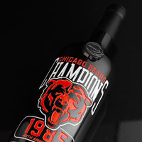 Close up view of a bottle of cabernet sauvignon with Chicago Bears Champions 1985 40th anniversary etched on the bottle